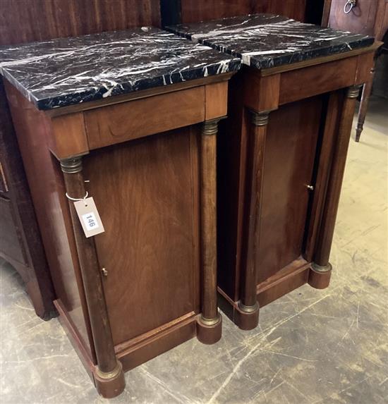 A pair of Empire style mahogany marble top bedside cupboards, width 40cm, depth 37cm, height 80cm (one marble top in need of replacemen